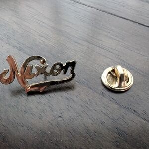 Nixon Gold Lapel Pin